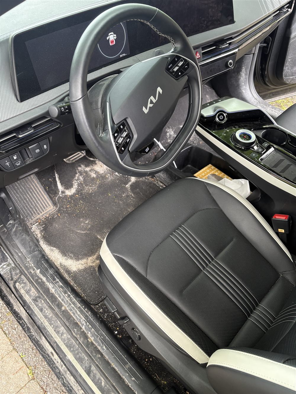 Car interior carpet covered in white road salt stains after an Ottawa winter — before detailing